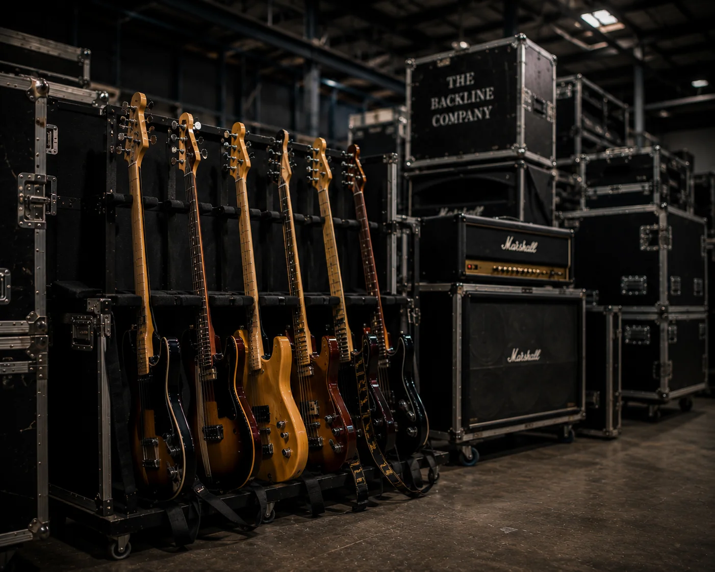 Organised backline equipment and flight cases representing The Backline Company warehouse preparation environment
