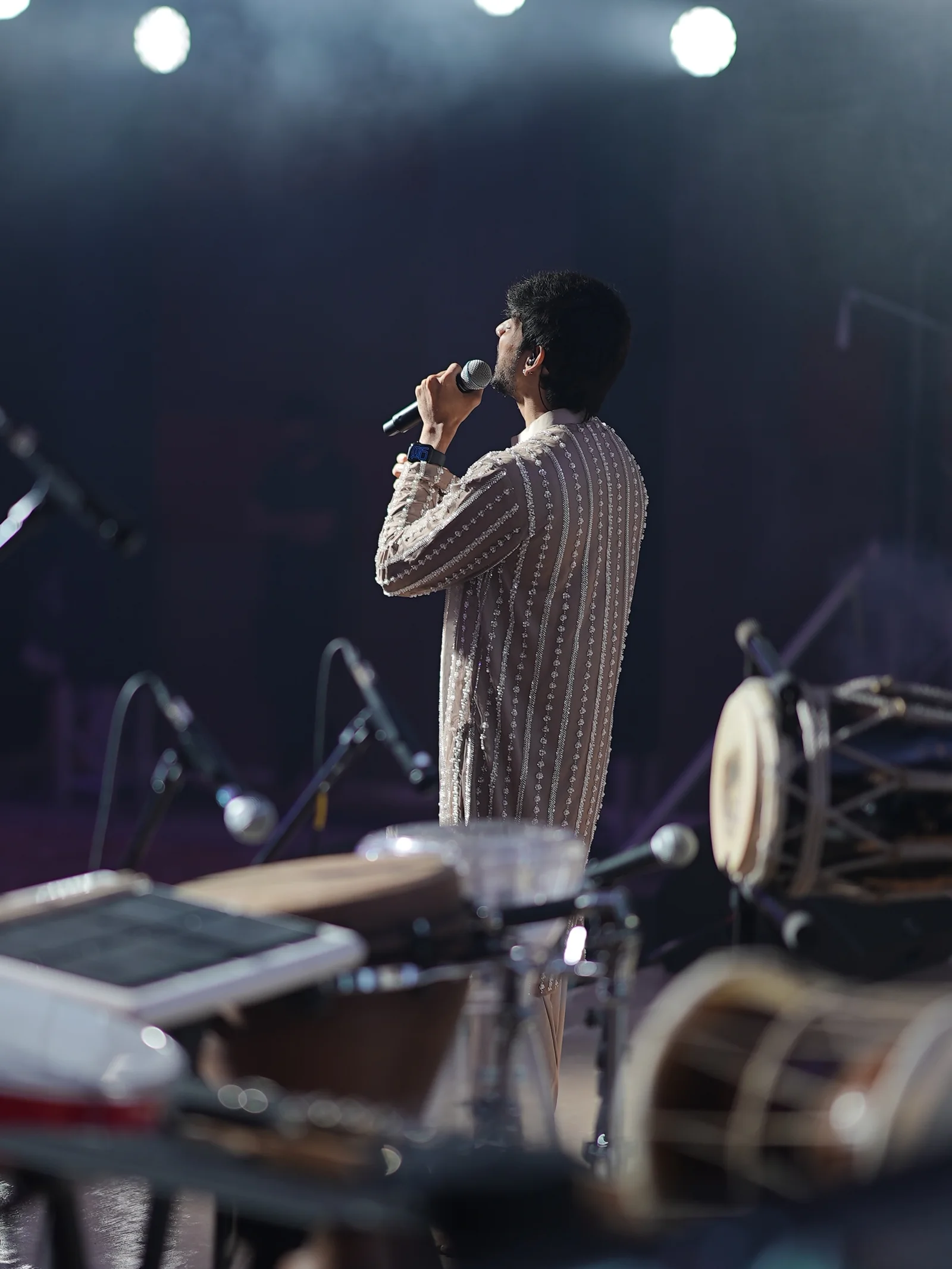 RSJ vocalist on stage with equipment in the foreground