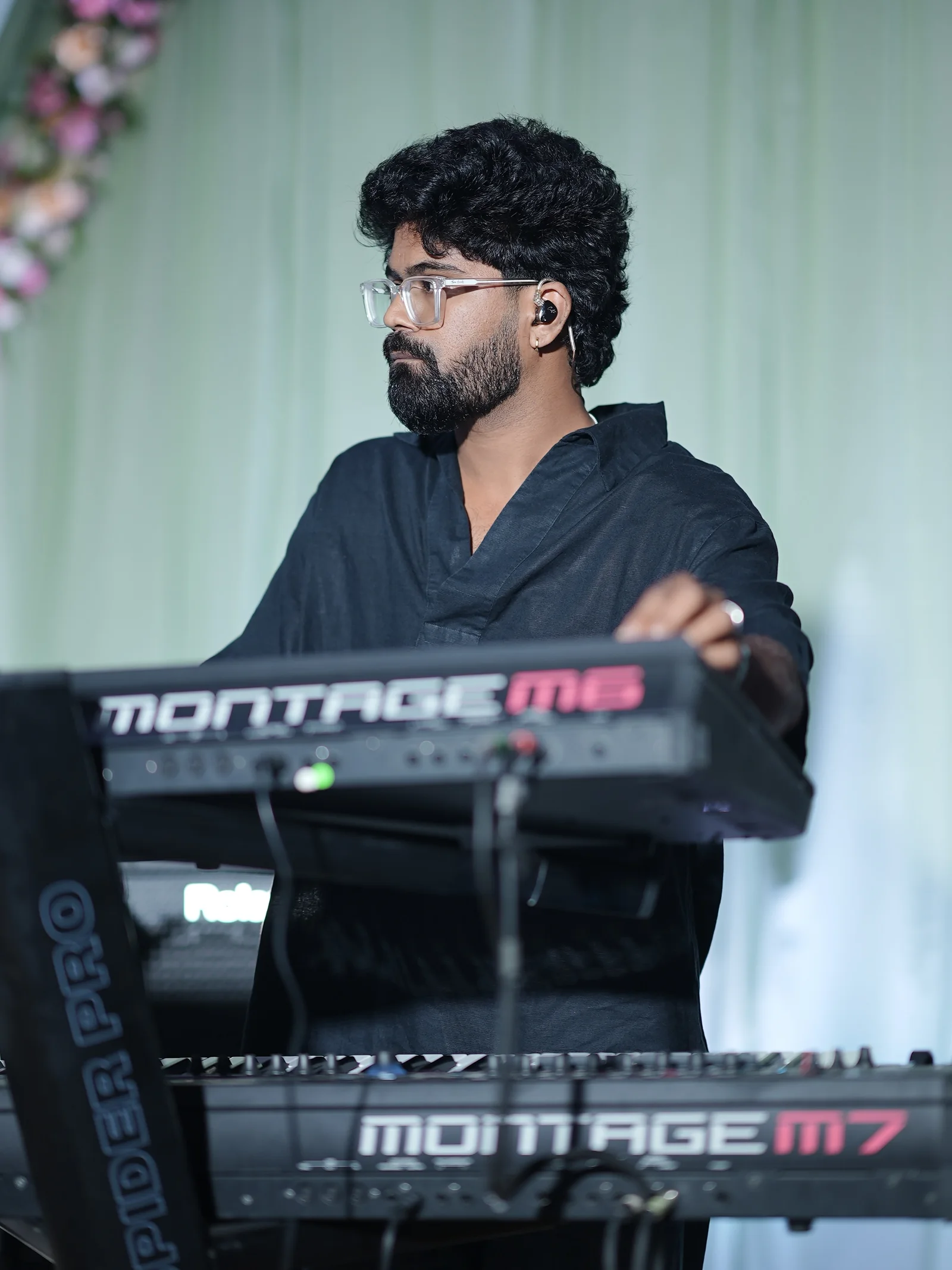 Keyboard player performing on the Yamaha MONTAGE keyboard setup