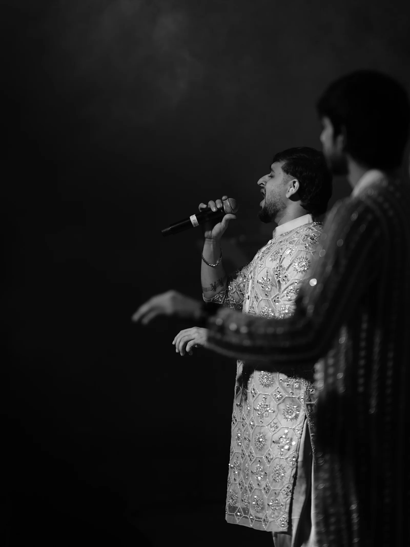 Black and white photograph of the RSJ vocalists performing