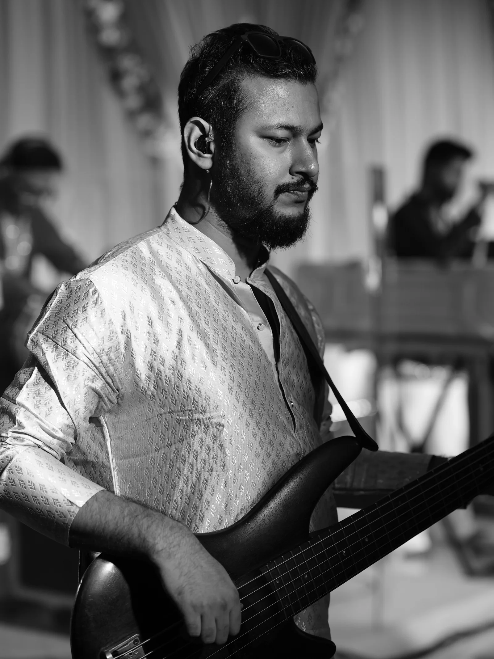 Bass guitarist performing with RSJ at NESCO Mumbai