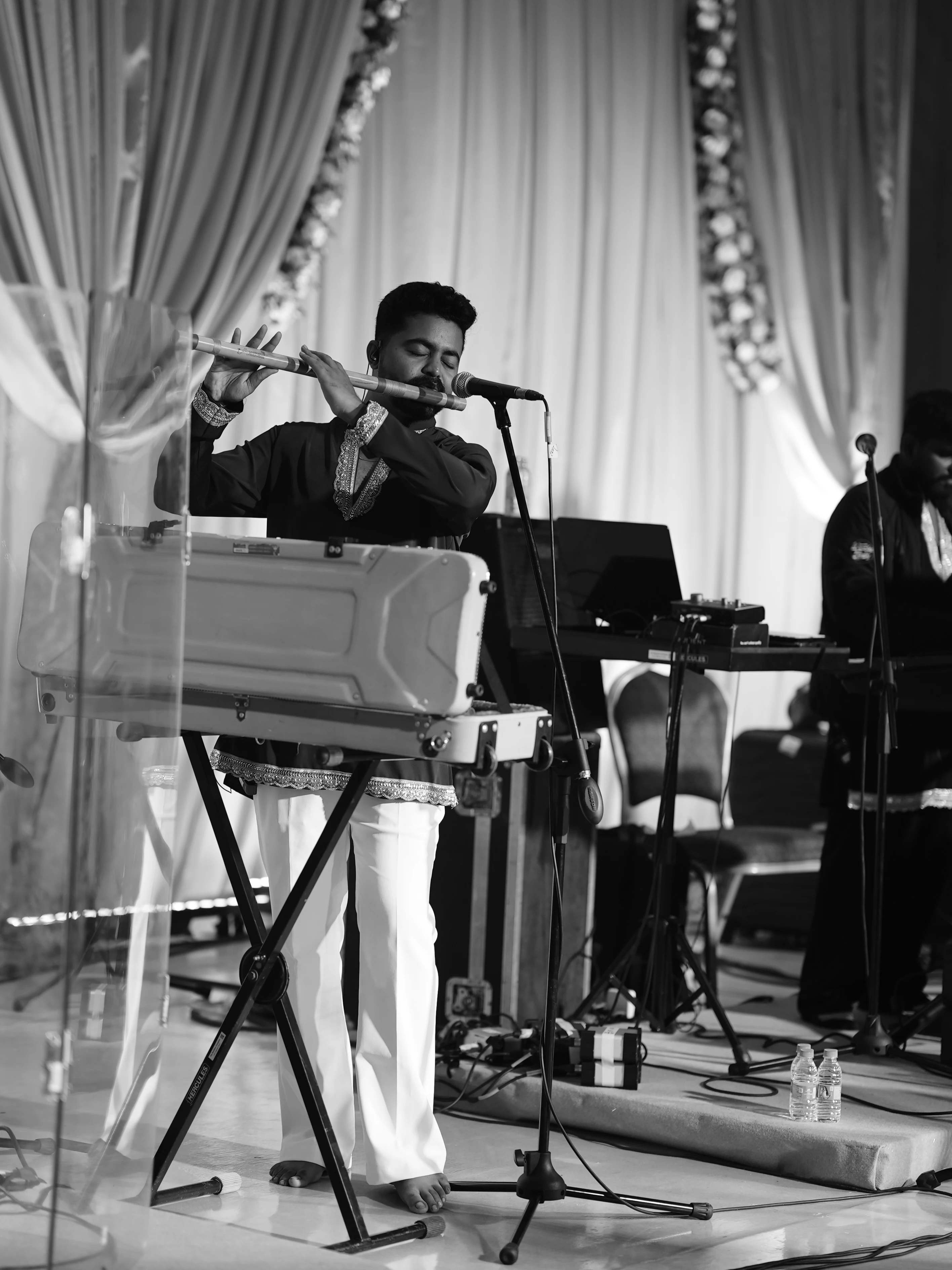 Flute player performing with RSJ at NESCO Mumbai