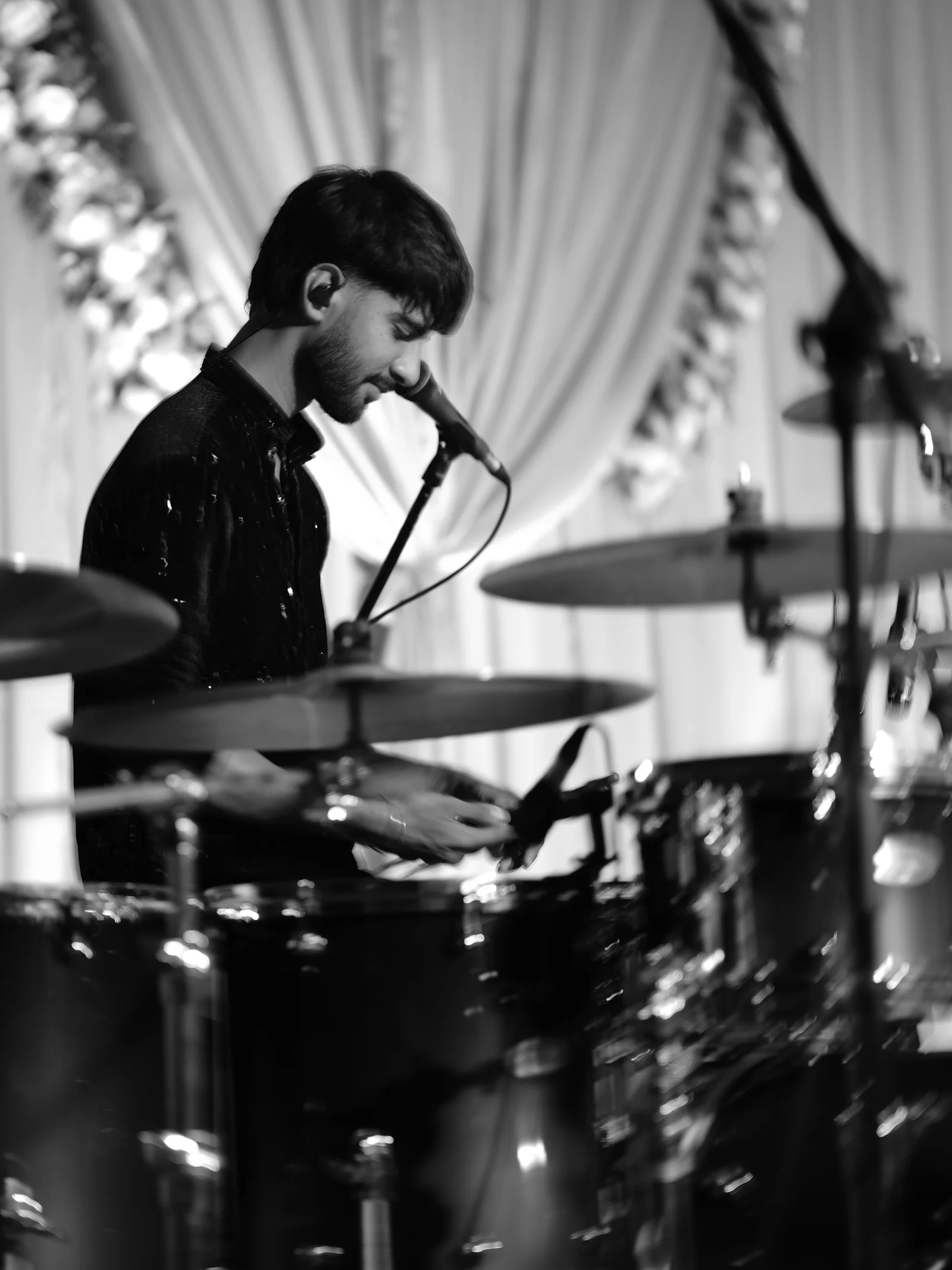 Drummer playing the drum kit during the RSJ performance