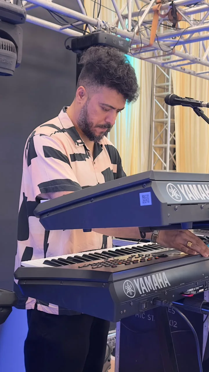 Musician at the prepared Yamaha keyboard rig